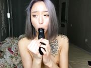 min_ki Slim asian girl sucking toy